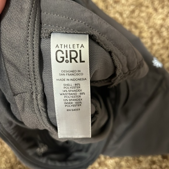 2 pairs (grey and black) size medium (8-10) athleta girl shorts. - Picture 5 of 11
